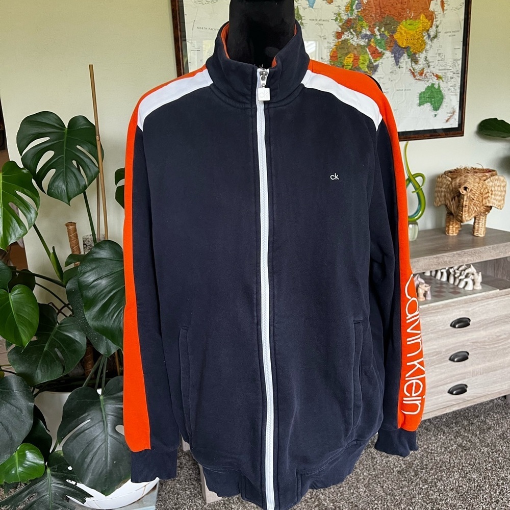 Calvin Klein Navy Blue Jacket with Orange Sleeves & White Accents